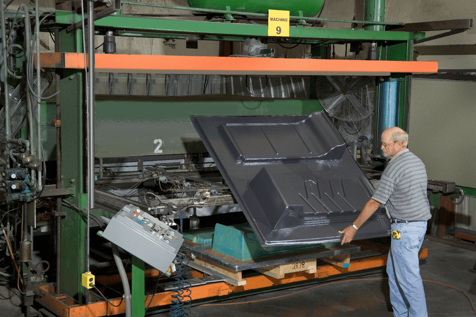 Large Part Being Removed From Oven
